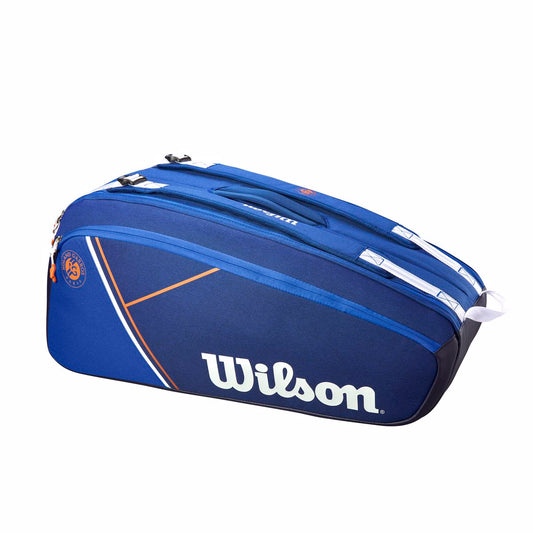 Wilson tennis bag in blue with stylish design and logo, perfect for storing rackets and gear.