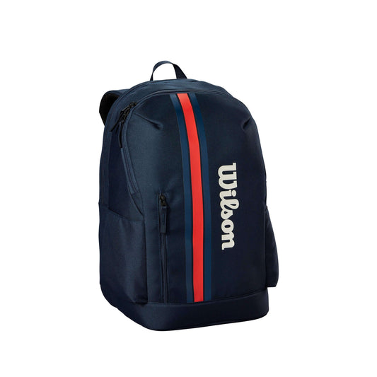 תיק טניס וילסון  | Team Backpack Wilson אפור בצבע navy עם רצועות אדומות ולוגו ווילסון.