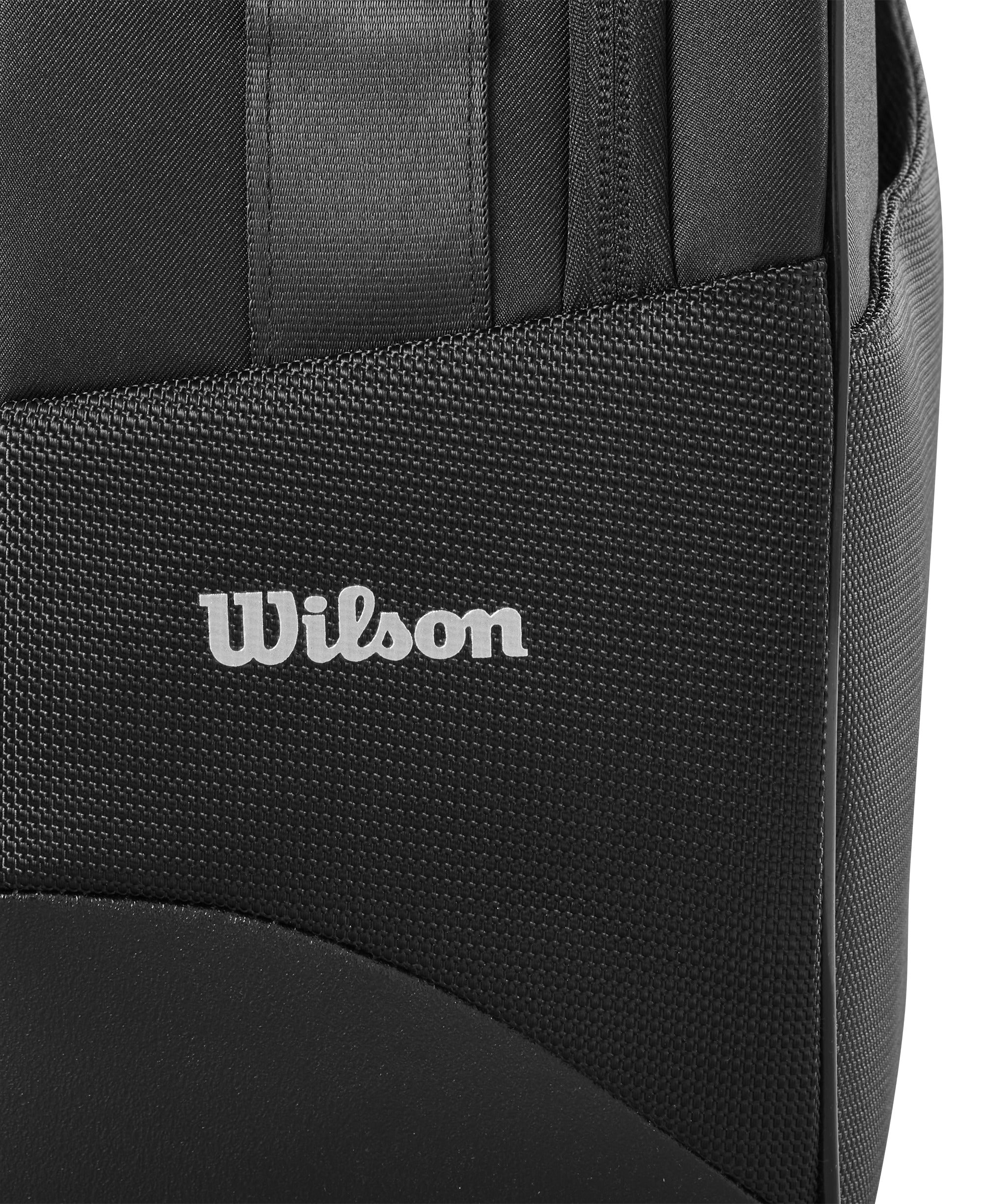 תיק טניס Wilson RF Tournament Racket Bag 9 Pack | וילסון עם לוגו Wilson ברור על רקע שחור.