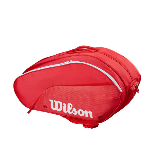 תיק פאדל Wilson Tour Red Padel Bag | וילסון בצבע אדום, תכנון מרווח עם תא מרכזי וידית אחיזה.