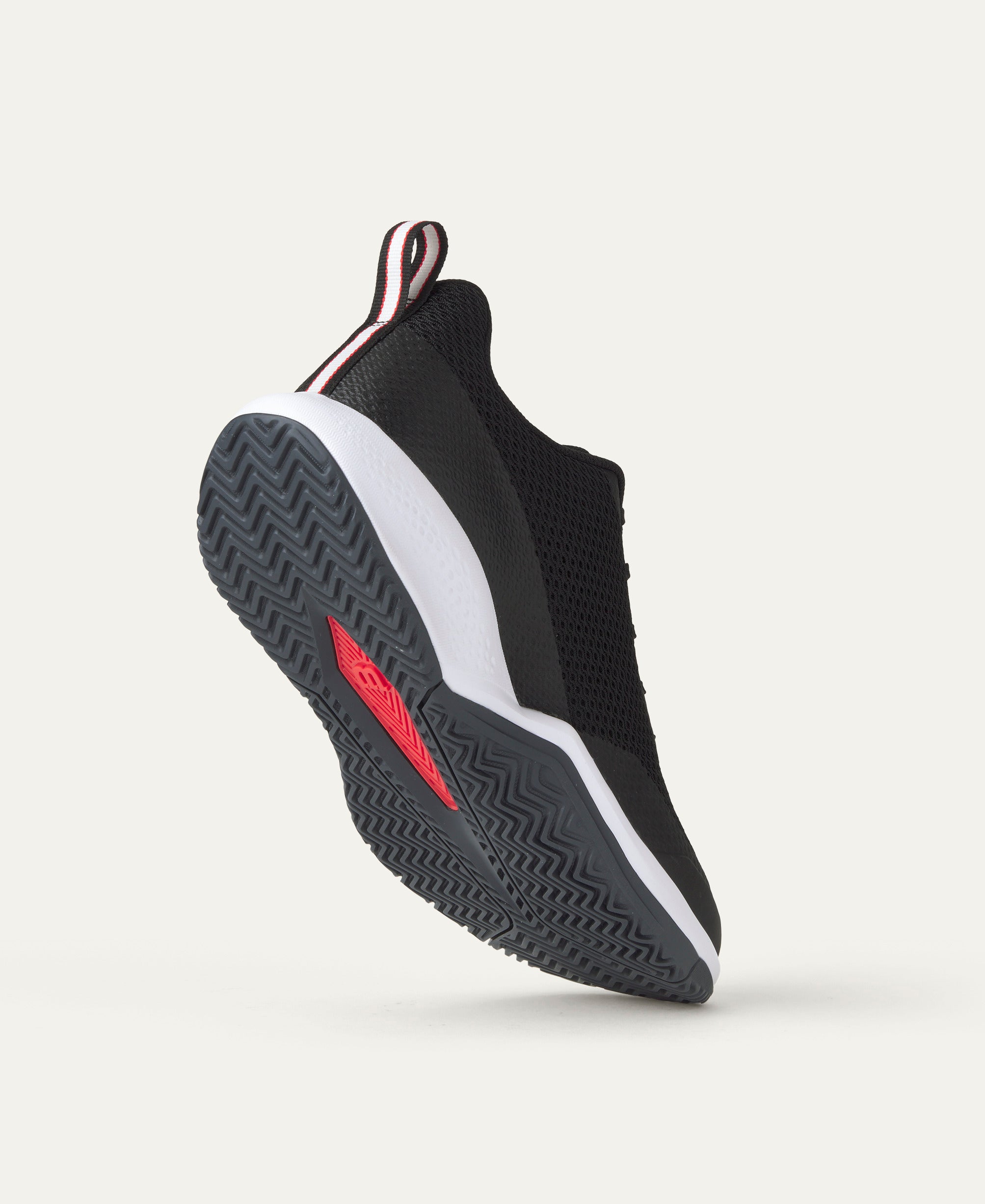 נעלי טניס גברים Wilson Rush Pro Lite | וילסון - מבט על סוליית נעליים קלות ועמידות בצבע שחור ואדום.