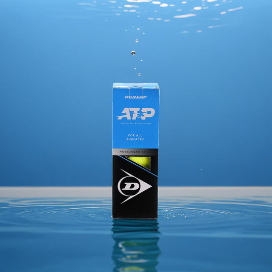 קופסת כדורי טניס Dunlop ATP Pressureless (3 כדורים בקופסה) | דנלופ צפה במים עם רקע כחול